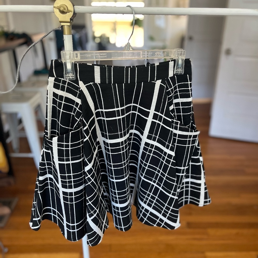 Plaid swing skirt with deep pockets